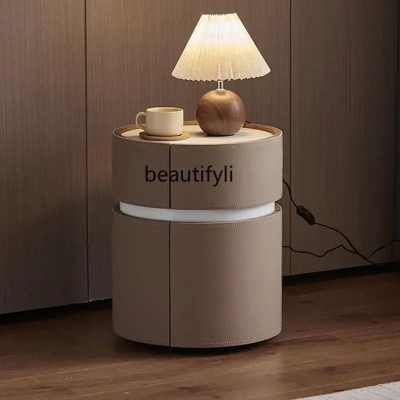 

xzSmart bedside table wireless charging light integrated saddle leather round bedroom locker