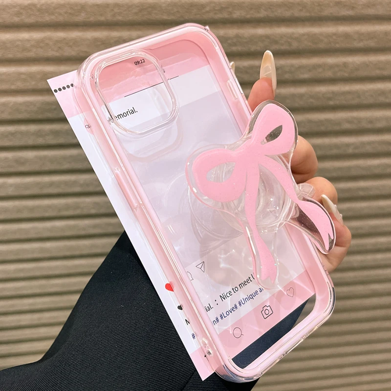 Bonita funda de teléfono con soporte de anillo Tok con agarre de lazo rosa para iPhone 13 11 14 12 15 16 Pro Max, funda transparente suave a prueba de golpes