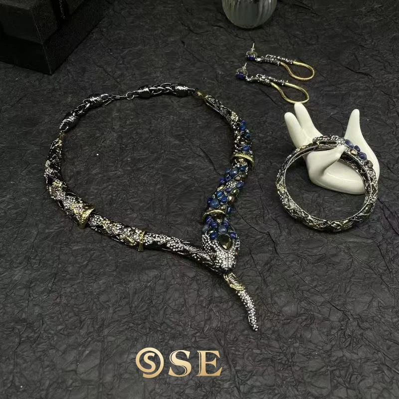 

Ghost Designer to Create European and American Jewelry Marking AB Copper Plated Real Gold Full Diamond Snake Necklace Bracelet