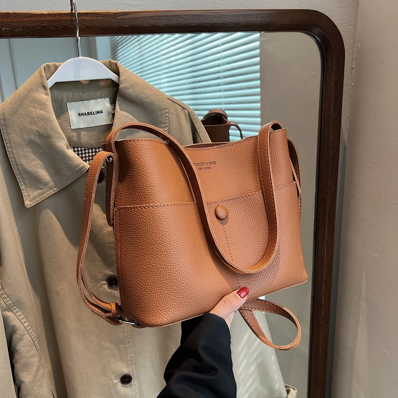 Bolso de mano de gran capacidad para mujer, bolso de cubo Simple que combina con todo, bolsos cruzados de hombro Vintage a la moda, otoño e invierno, nuevo