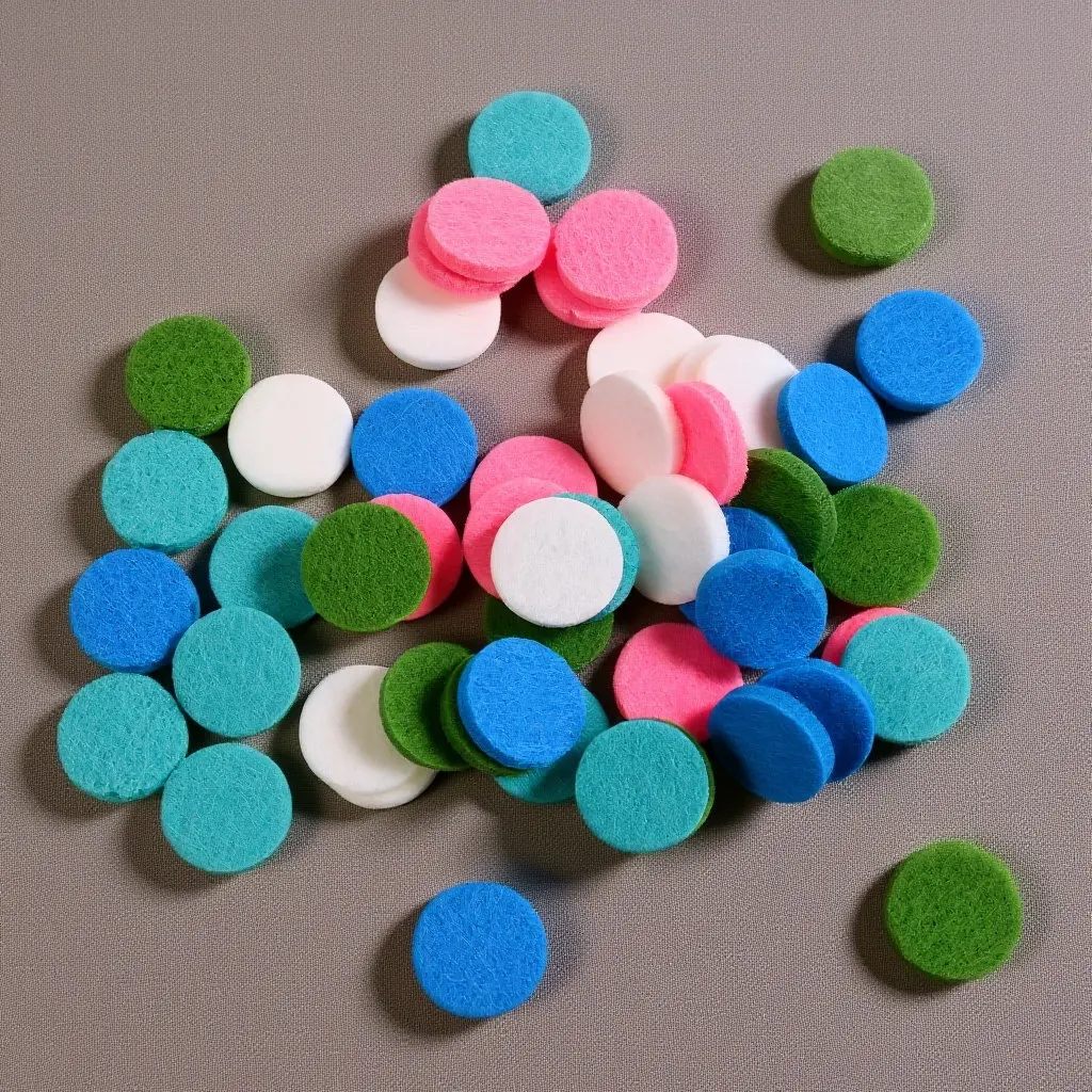 50-unidades-de-almofadas-de-algodao-para-Oleos-essenciais-redondas-com-nucleo-de-fibra-para-medalhoes-de-aromaterapia-recargas-de-difusores-de-25mm-clipe-de-ventilacao-automotiva-e-almofadas-para-pulseiras
