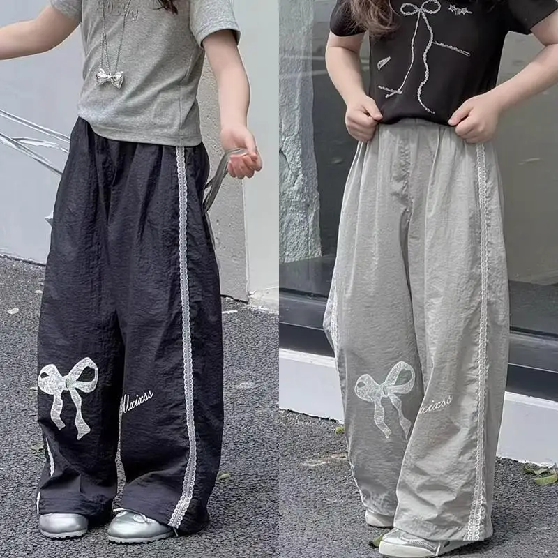 

Новинка 2026: Летний спортивный костюм для подростков, полосатые брюки с принтом и бантом в стиле хип-хоп, повседневные свободные широкие брюки для девочек, размеры 4, 5, 8, 10, 12, 14 лет