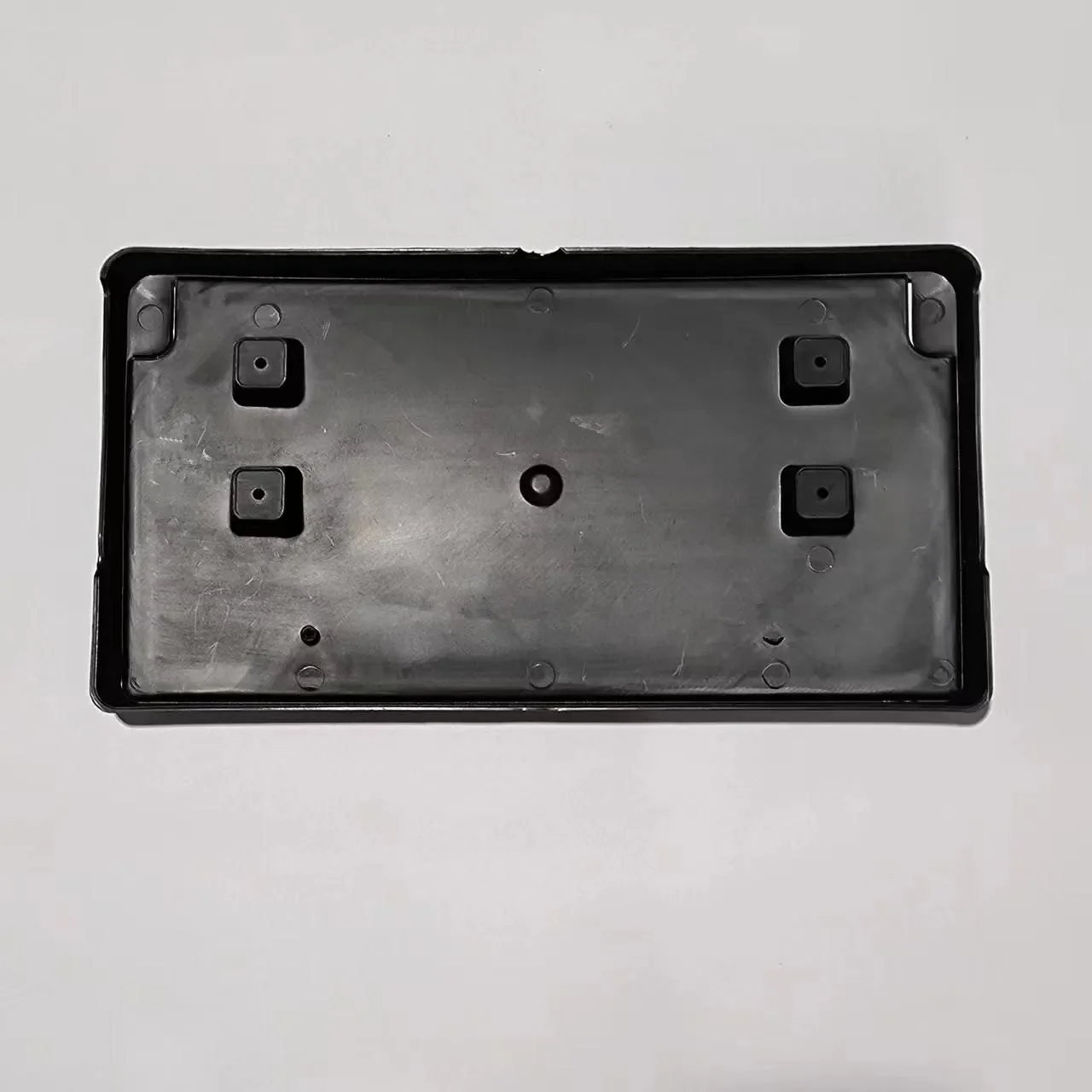 

For Jeep Wrangler (2018-2024) Front Bumper License Plate Holder - Part Number 68295610AA - Direct Replacement
