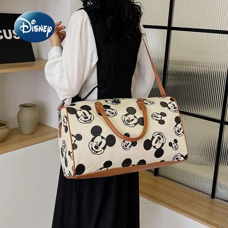 Nuevo bolso de viaje de Mickey de Disney, bolso de viaje portátil de marca de lujo a la moda para mujer, bolso de viaje tipo bandolera con un hombro