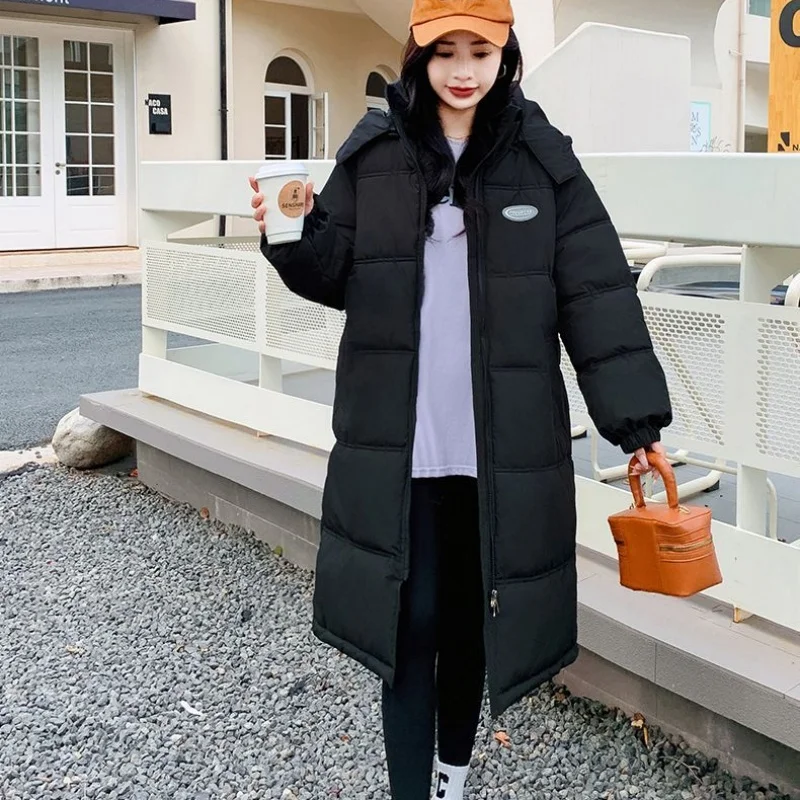 

Women Black Detachable Hood Long Cotton Coat Women Oval Patch Logo Zip Up Elastic Cuffs Warm Knee-Length Winter Outer Coat