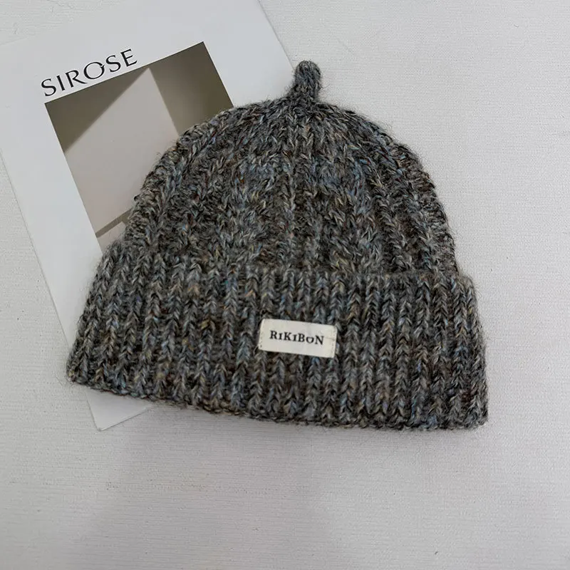 Men and Women's New Autumn and Winter Simple Pullover Pacifier Knitted Hat Outdoor Ear Protection Mixed Color Skull Beanie Cap