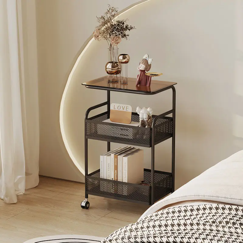 A few bedrooms near the bedside of the cream wind can move the living room. online celebrity creative mini storage cart glass so