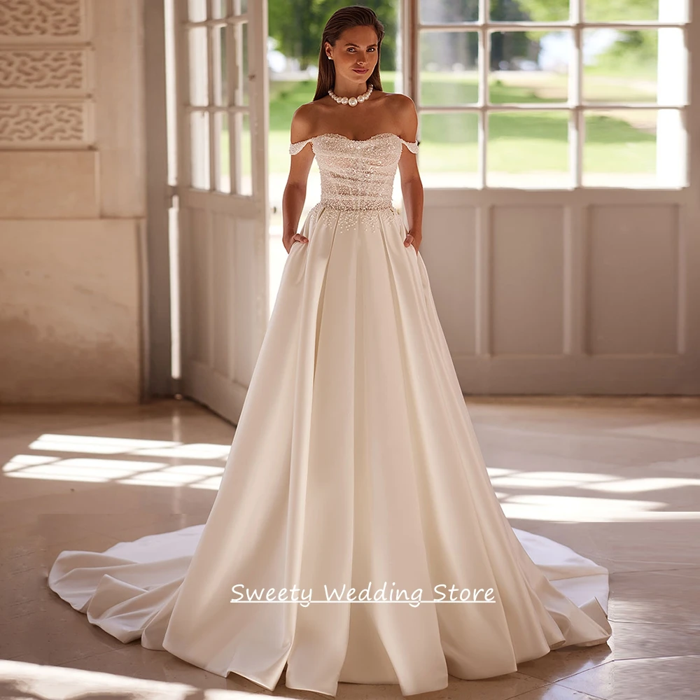Maßgeschneidertes Hochzeitskleid Modern Schulterfrei mit Perlen und Pailletten Durchsichtiges Schleppkleid A-Linie Satin Brautkleid