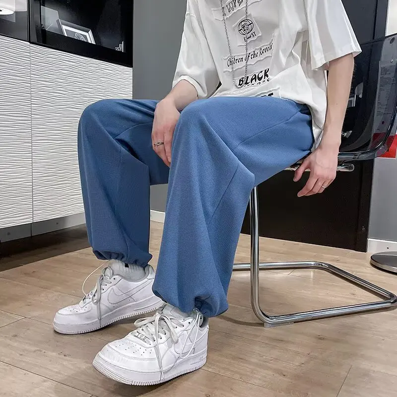 

Ice silk pants for men, summer thin style, trendy ankle tied sports pants, loose and wide legs, hanging and casual pants