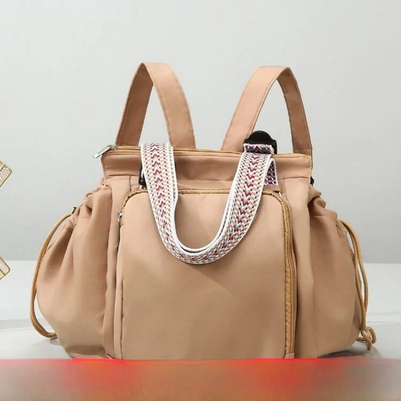 2026 New Lightweight Travel Backpack Large Capacity Storage Double Shoulder Baby Carrier Bag Multi-Function Maternity Bag