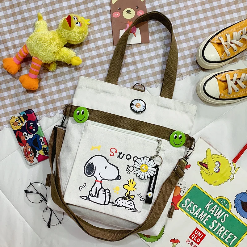 Cute Anime Fashion Trend Snoopy Canvas Bag Messenger Bag studente Unisex Cartoon borsa a tracolla borsa di stoffa coppia regalo con ciondolo