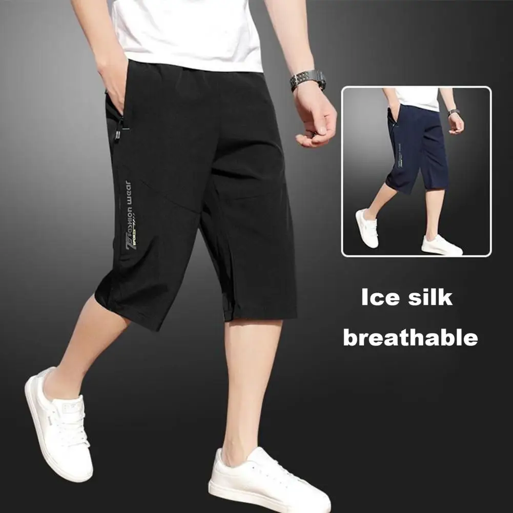 Cintura elástica masculina cortada calça com bolsos de zíper, cor sólida, macia, respirável, comprimento de meio de panturrilha, confortável