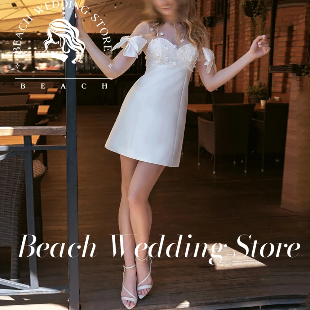 

Beach Customized Sexy Short Wedding Dresses Short Sleeves A-Line Bridal Growns Bows Pearls Above Knee Length Illusion Vestidos