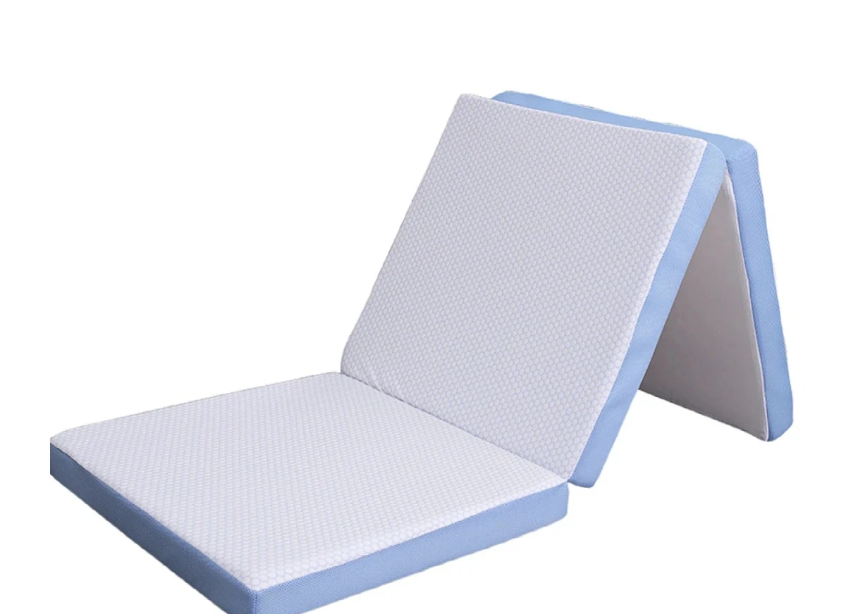 Memory foam tri-fold mattress in handbag with removable cover