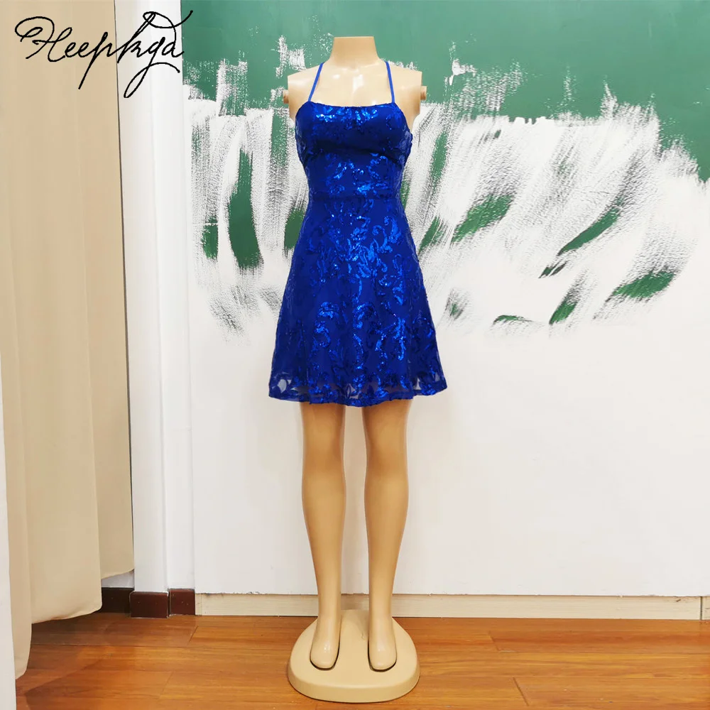 

Sexy Royal Blue Short 2024 Prom Dresses Spaghetti Straps A Line Backless Shiny Sequin Girls Homecoming Party Gowns Wholesale