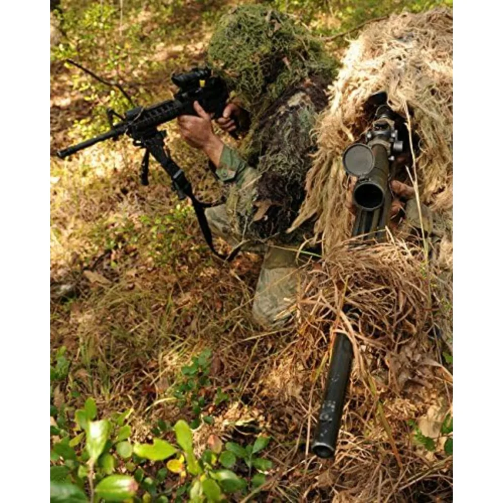 Sharpshooters sneak through the forest in their ghillie suits Poster Print by Stocktrek Images (22 x 34)