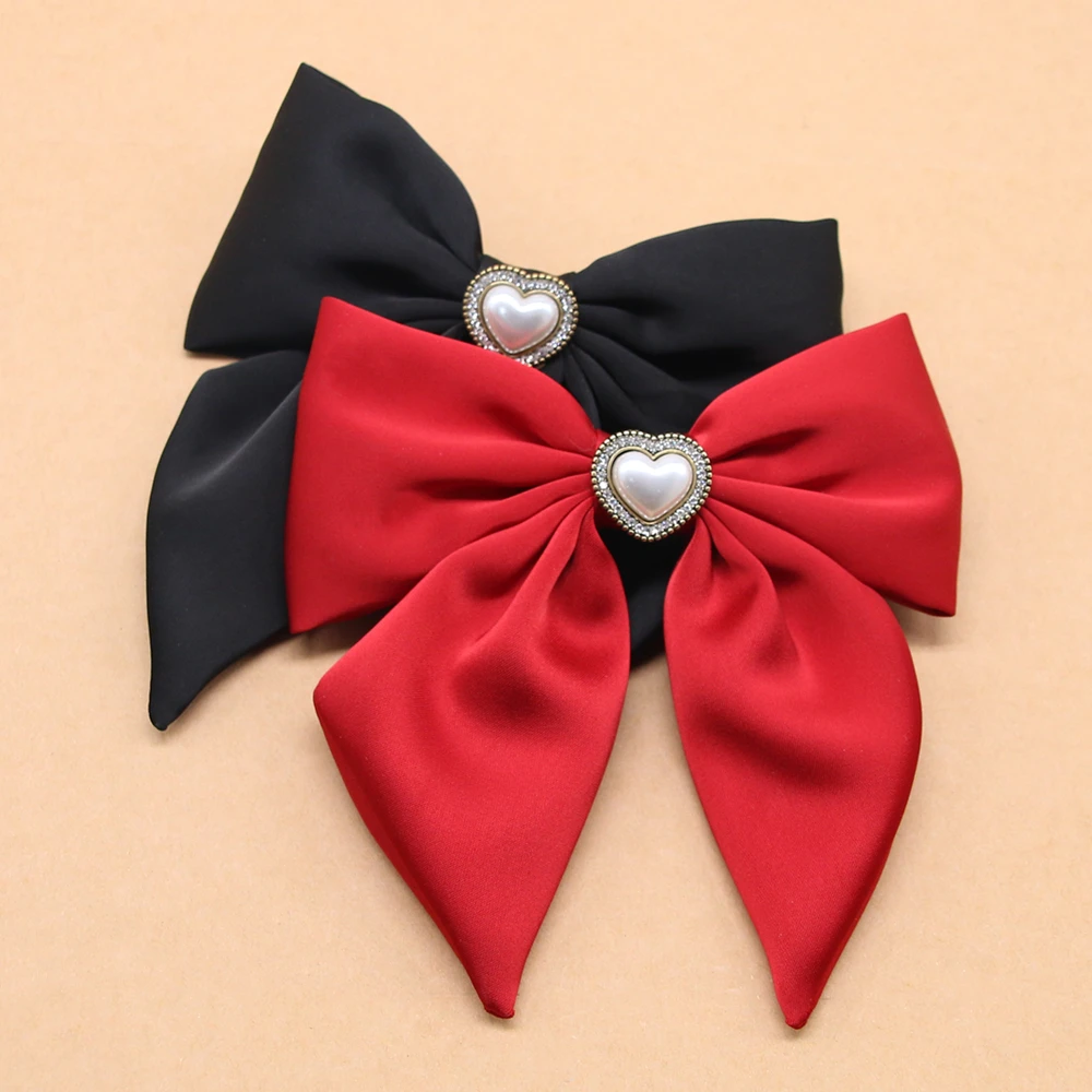 קליפ ראש מתכתי עם קשת סאטן חלקה בצבע אחיד לבנות עם פנינה ואבן חן אלגנטית לאביב/קיץ