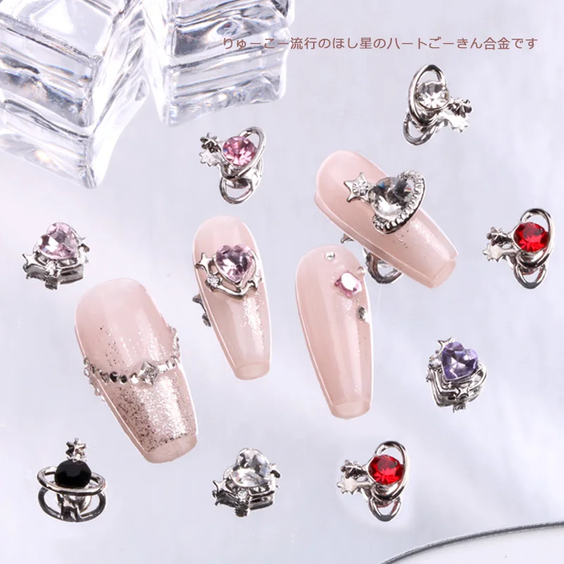 TSZS 10PCS/Lot Metal Small Planet Love Heart Shape Nail Figures Charm 3D Nail Parts Art Decorations Accessories Home DIY