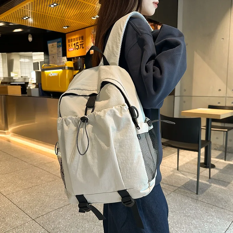 

2025 New Lightweight Waterproof Multi-Pocket Unisex Backpack for Men and Women, Large Capacity for Commuting and Travel
