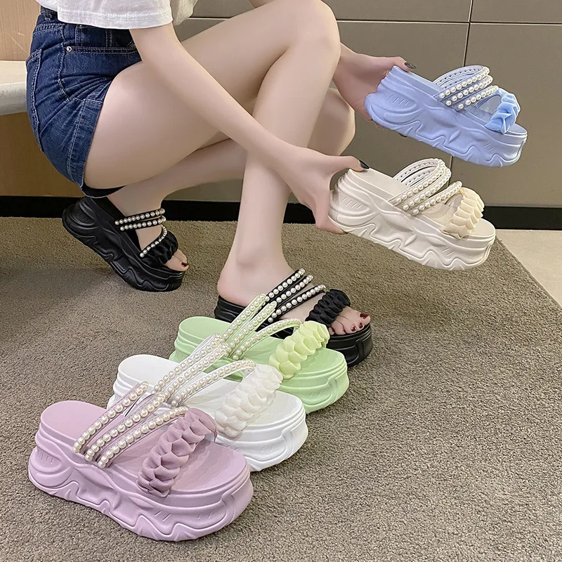 

2025 Hot Seller New Thick Soled Sponge Cake Sandals for Women's Outerwear, Slope Heel Beaded Sponge Cake Bottom Cool Slippers