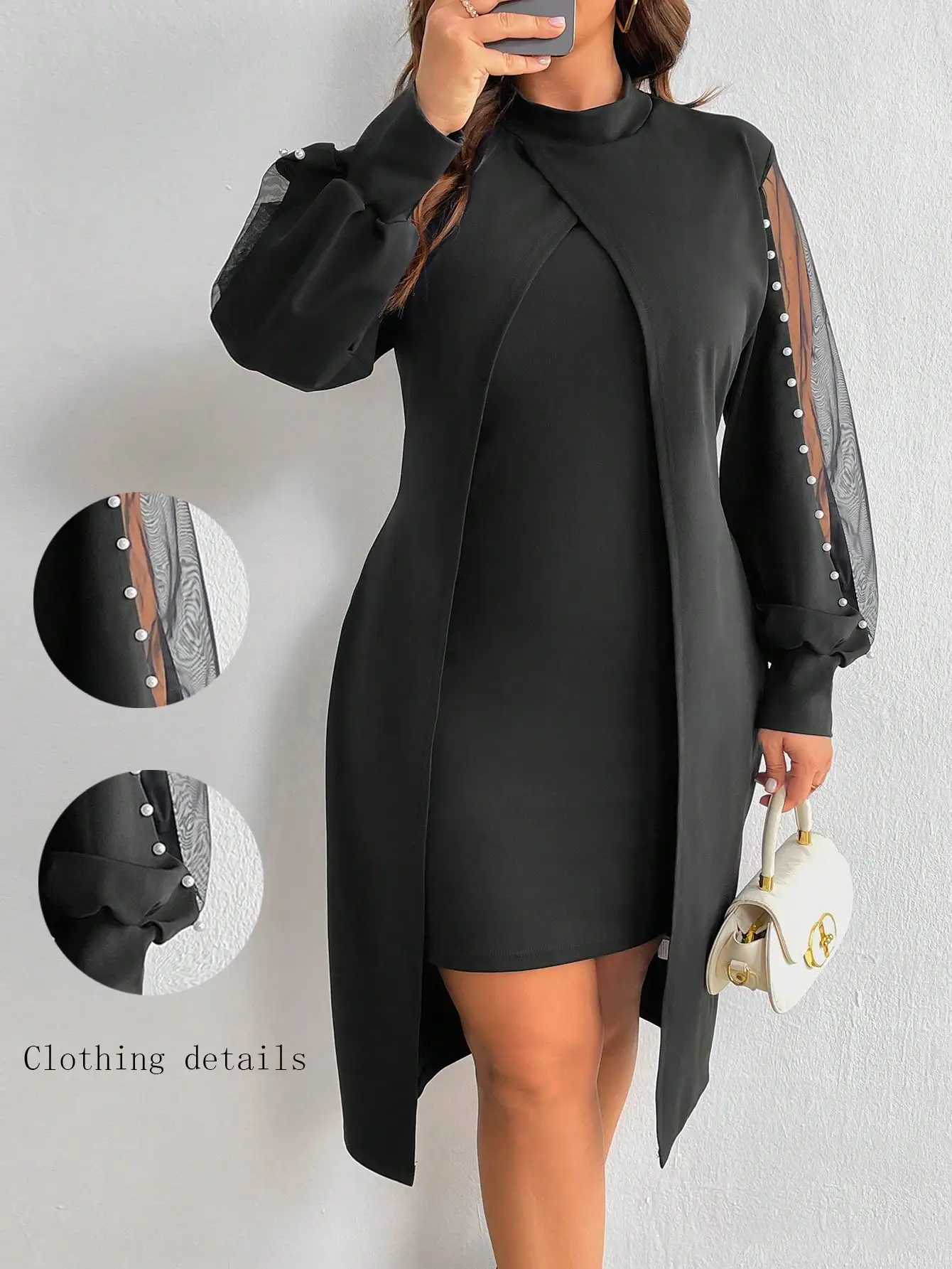 

Элегантное черное платье с длинными рукавами, сетчатыми вставками и жемчужными пуговицами, высоким воротником и асимметричным подолом.