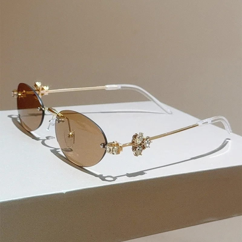 novos-Oculos-de-sol-ovais-sem-armacao-y2k-para-mulheres-Oculos-de-sol-vintage-punk-de-luxo-com-cristais-de-diamante-rosa