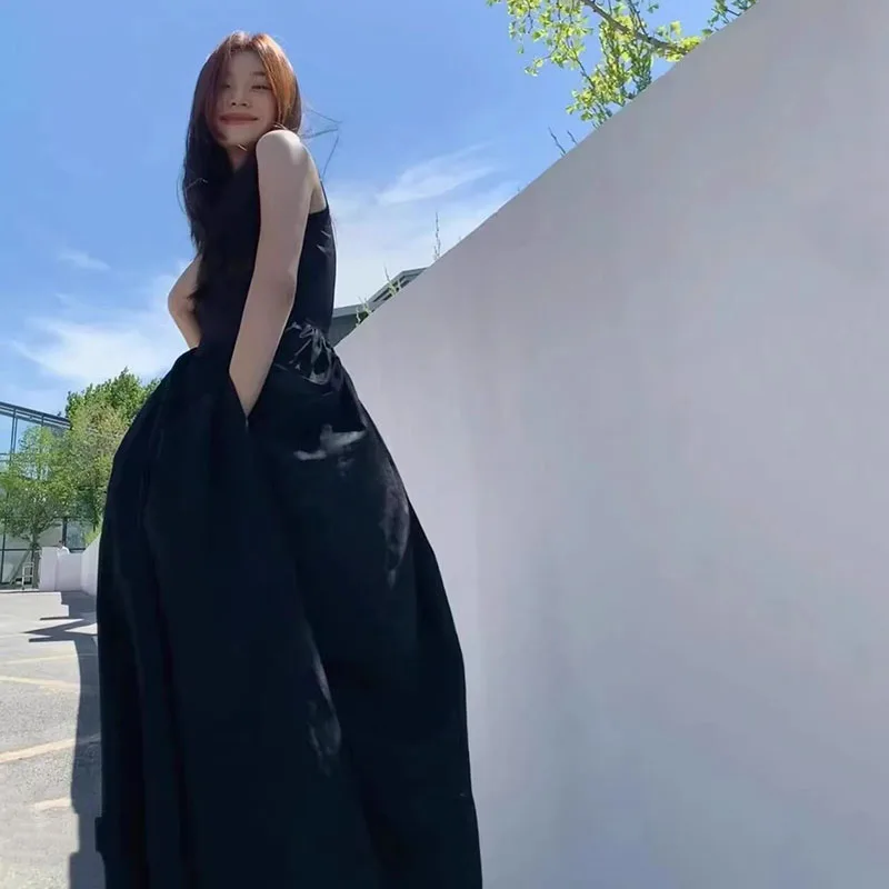 เดรสยาวสีดำแบบไม่มีสาย ผู้หญิง แฟชั่นทรงเข้ารูป แขนกุด คอทรงโอ เอวสูง ชุดเดรสผู้หญิง ฤดูใบไม้ผลิ ฤดูร้อน 2025 ใหม่ ชุดเดรสสำหรับงานปาร์ตี้