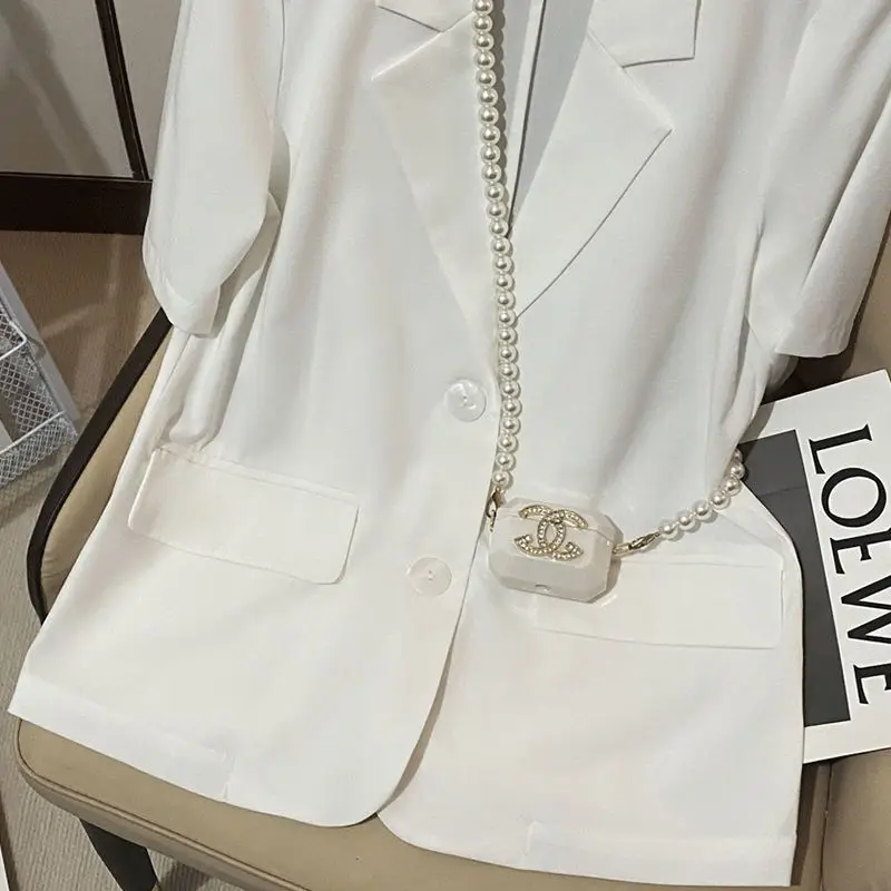 Blazers de manga curta entalhados femininos, soltos, monocromáticos, moda senhora do escritório, casual, temperamento fino, bolsos de botões, roupas de verão, 2023