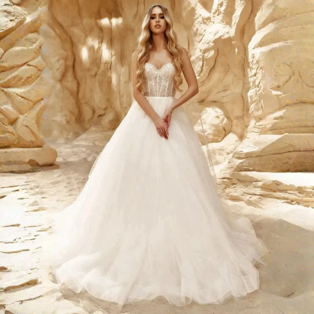 Gorgeous Wedding Dresses Sweetheart Neck Sparkling Elegant Bridal Gowns for African Arabic Beaded Lace Beach Tiered Tulle Dress