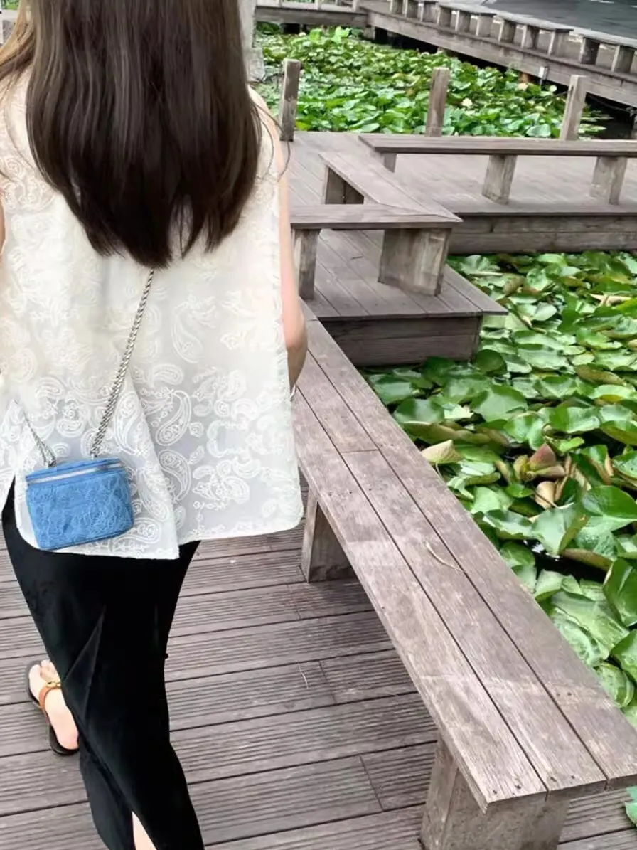 Nowa chińska odzież damska na lato 2025, modna warstwowa biała kamizelka, uniwersalna odzież wierzchnia z bawełny ze stójką...