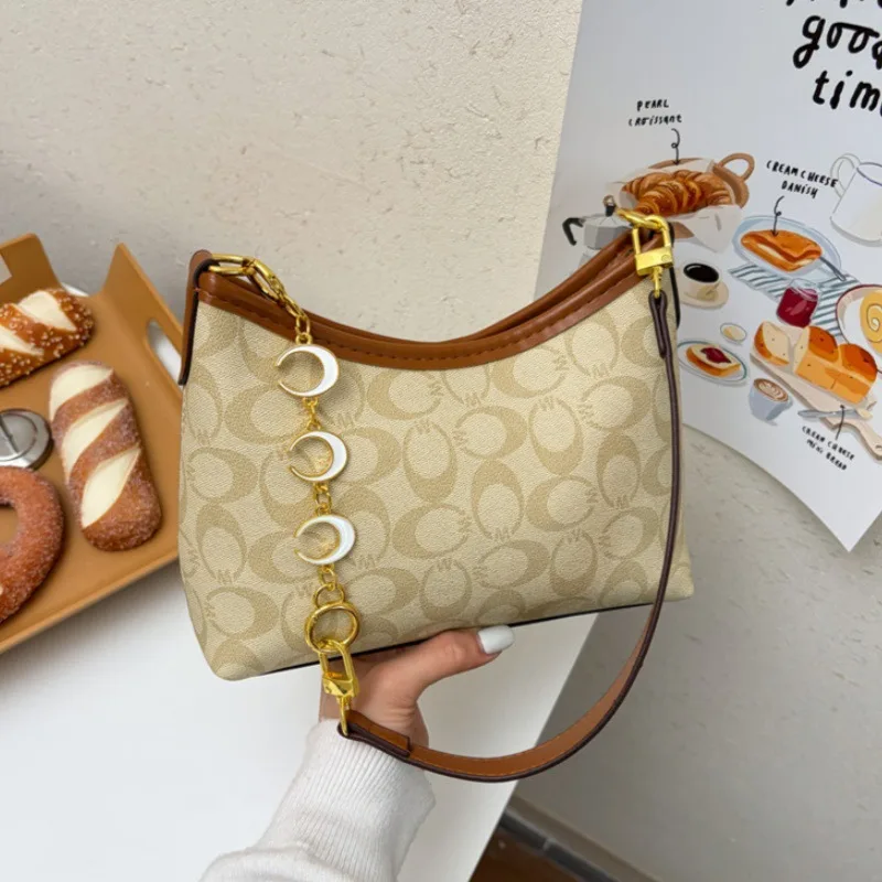 bolso-de-viaje-clasico-modelo-2026-bolso-versatil-y-moderno-con-estampado-para-llevar-bajo-el-brazo-en-la-mano-al-hombro-o-cruzado