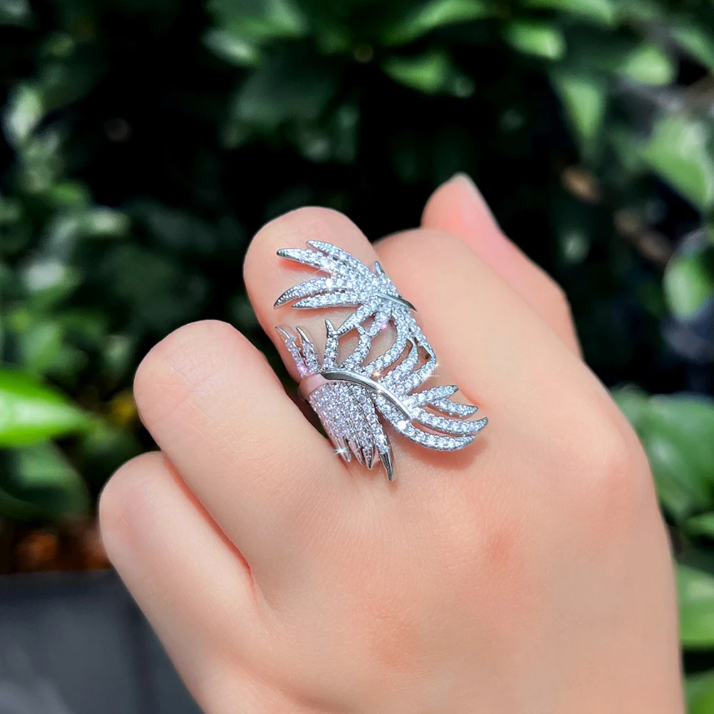 

CWWZircons Adjustable Micro Paved Cubic Zircon Big Feather Long Finger Rings for Women Chic Summer Party Jewelry Accessory J0194