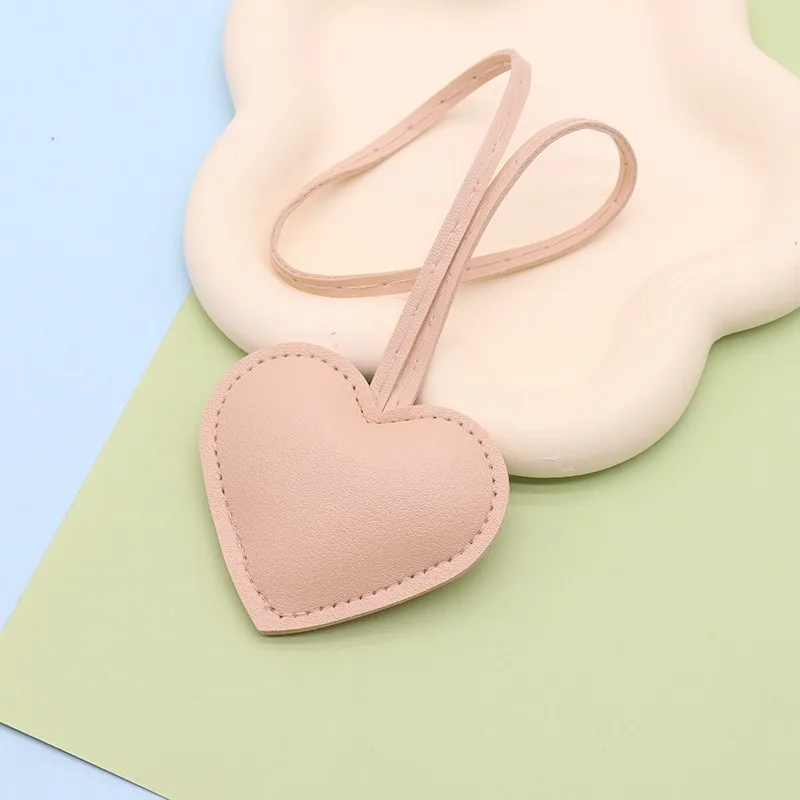 المفاتيح الجلدية مفتاح فوب حقيبة سحر 7*6 سنتيمتر مجوهرات للنساء مفاتيح على ظهره