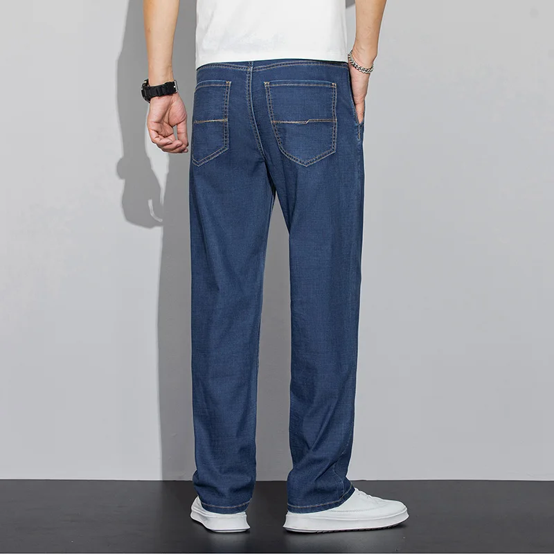 Lyocell tessuto estate Jeans da uomo ultrasottili morbido drappo sciolto dritto marchio Casual Denim pantaloni Street gamba larga pantaloni