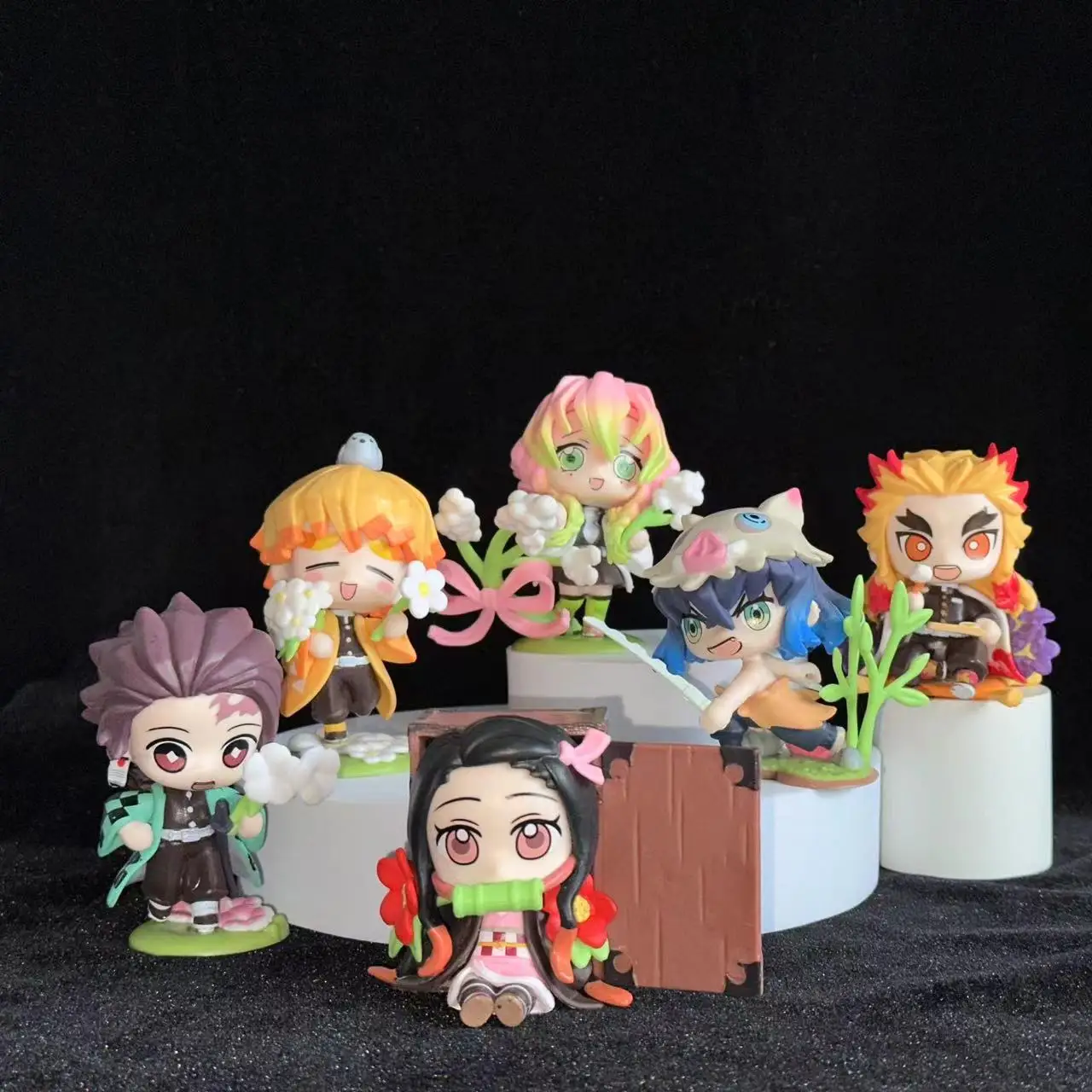 Authentic 6-piece Demon Slayer Birth Flower Series Action Figures, featuring Tanjiro, Nezuko, Kyojuro, Mitsuri, and Zenitsu