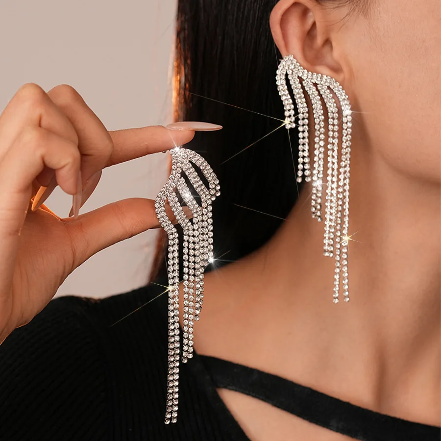 Light luxury  diamond-encrusted wings fringed integrated stud earrings, women with niche personality and high-end temperament