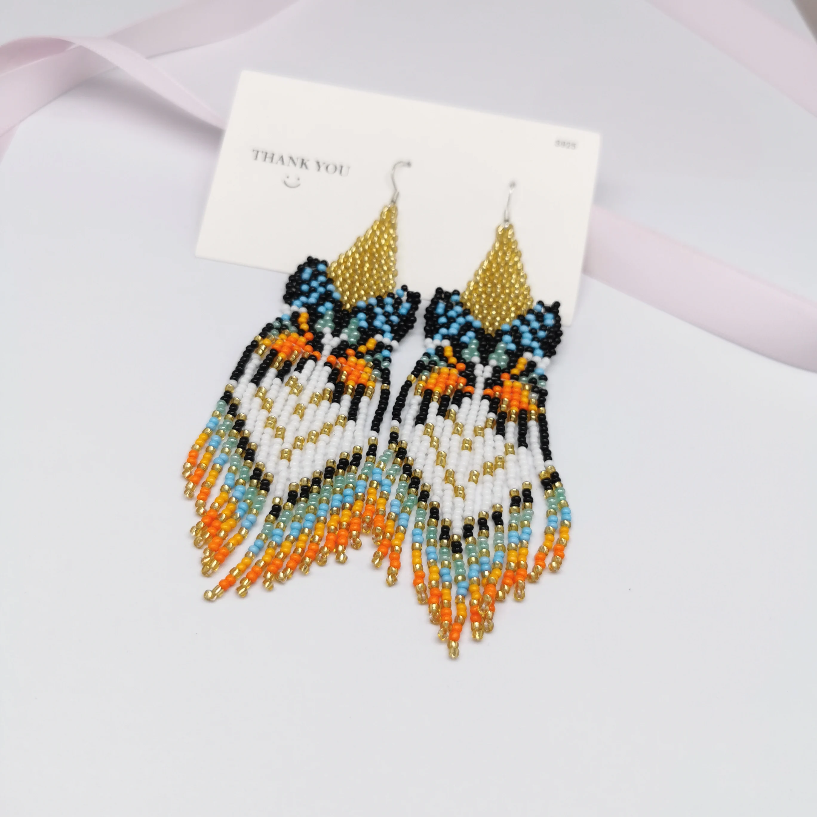 Rice bead earrings  Hand woven  fashion  butterfly  personality  Beading  Simplicity  Bohemia  alloy  ma\'am  Fringed earrings