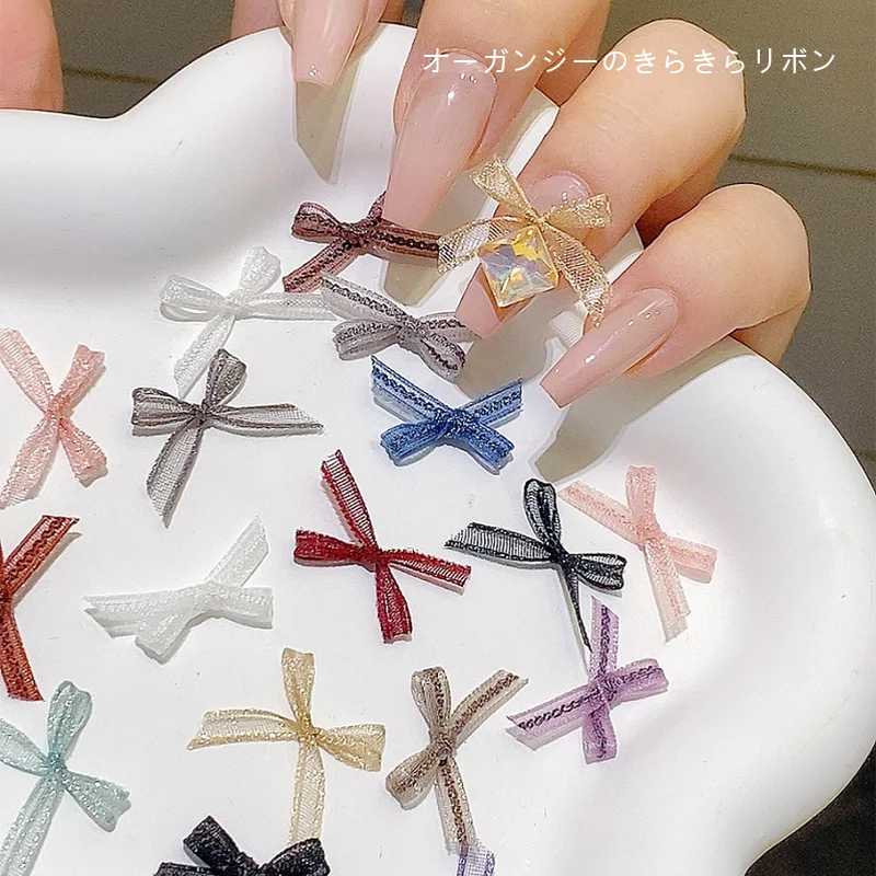 

25pcs/lot Bow Nails Accessories Multiple Color 3D Mesh Bowknot Designer Charms Jewelry For Nails Trendy Fabric Nail Art Deco DIY