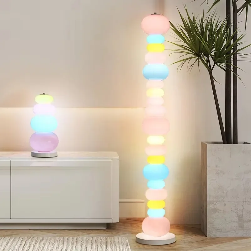 Candy rainbow floor lamp next to bedroom sofa Cream creative floor lamp