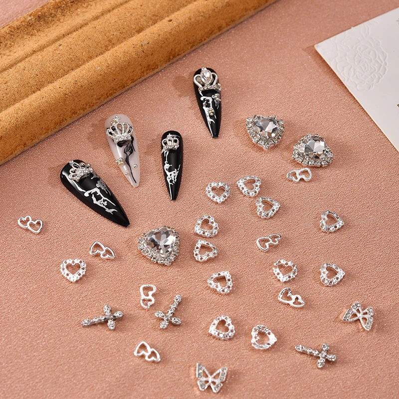 60PCS Silver Nail Charms Crystal Heart Nail Charms 3D Alloy Cross Nail Charms Metal Butterfly Charms Nail Gems Rhinestones view 3
