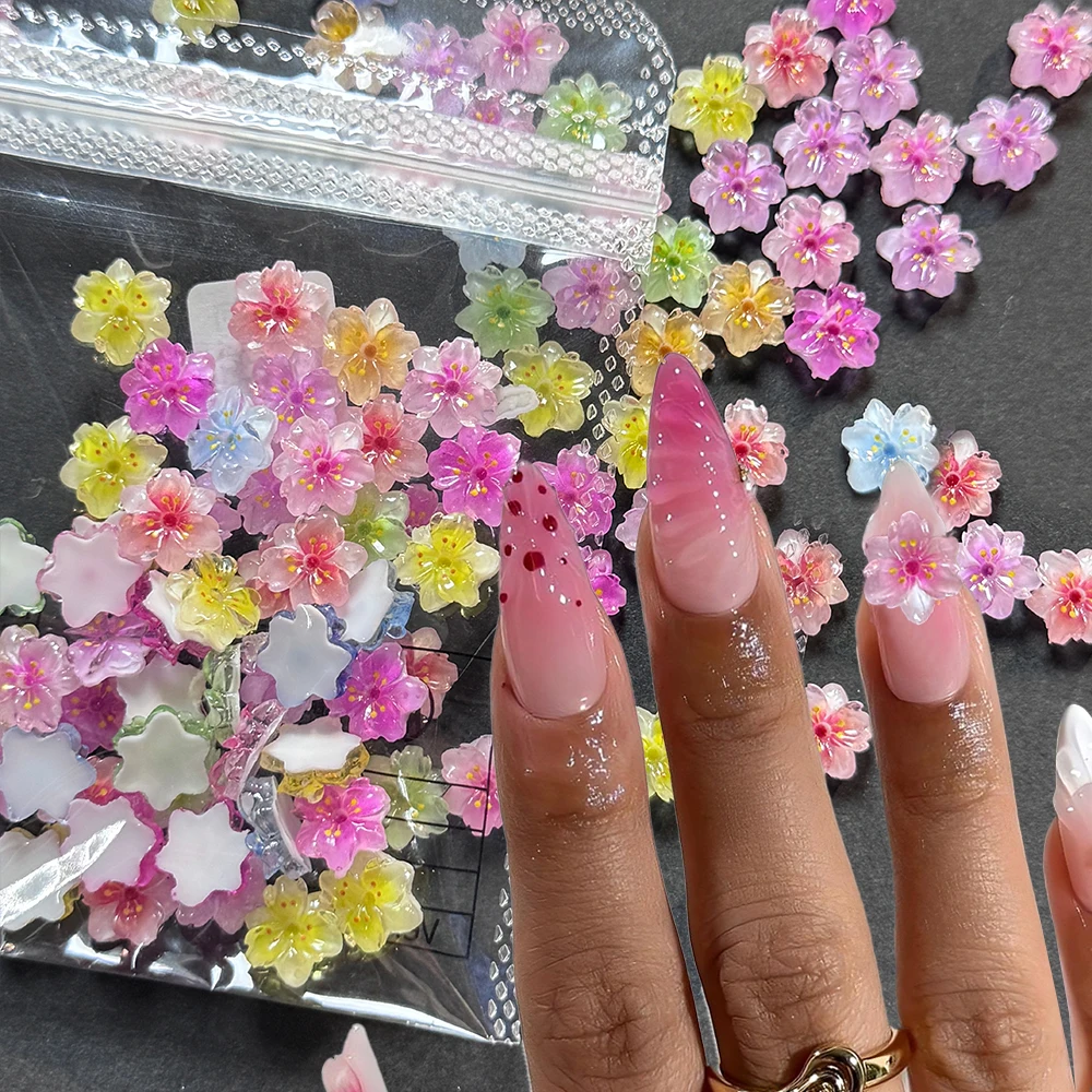 

100Pcs Pink Gradient Cherry Blossoms Nail Accessories 3D Mixed Resin Ice-Translucent Flower Nail Charms Sakura DIY Nail Art Deco