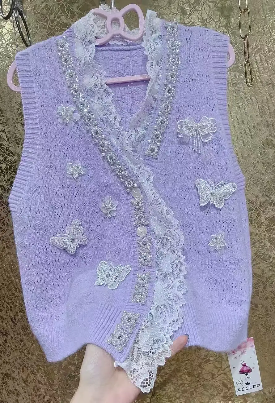 فاخر فريد تصميم المرأة تريكو سترة سترة صوف من دون أكمام اتجاهات 2025 الخريف محبوك ملابس امرأة