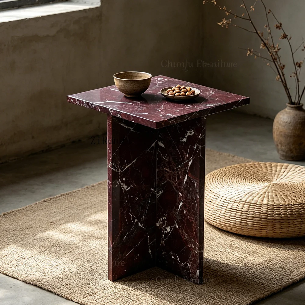 Marble coffee table, sculptural X-frame, dark red stone table, high-end living room furniture