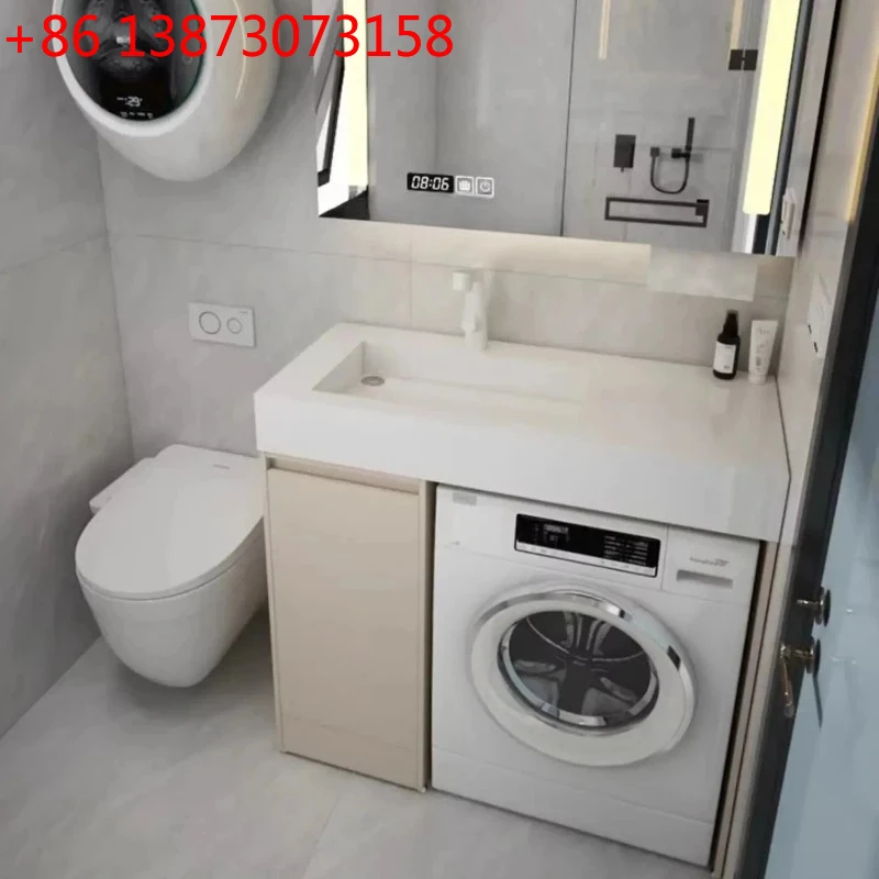 

Компактная стиральная машина-тумба для малогабаритных квартир с интегрированной раковиной из каменной плиты