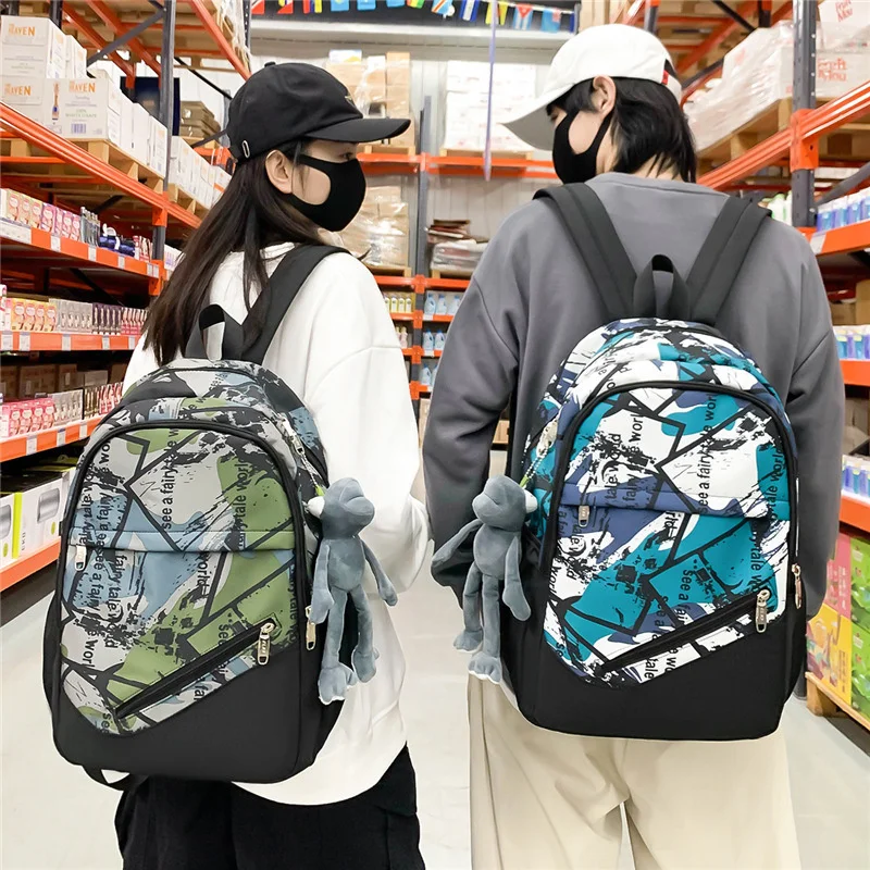 New female backpack Korean version junior high school student schoolbag men's fashion trend youth leisure travel backpack