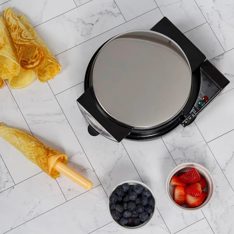 Maker Features Nonstick Surface and Instant Heat Recovery with Temperature Control and Ready Light To Make