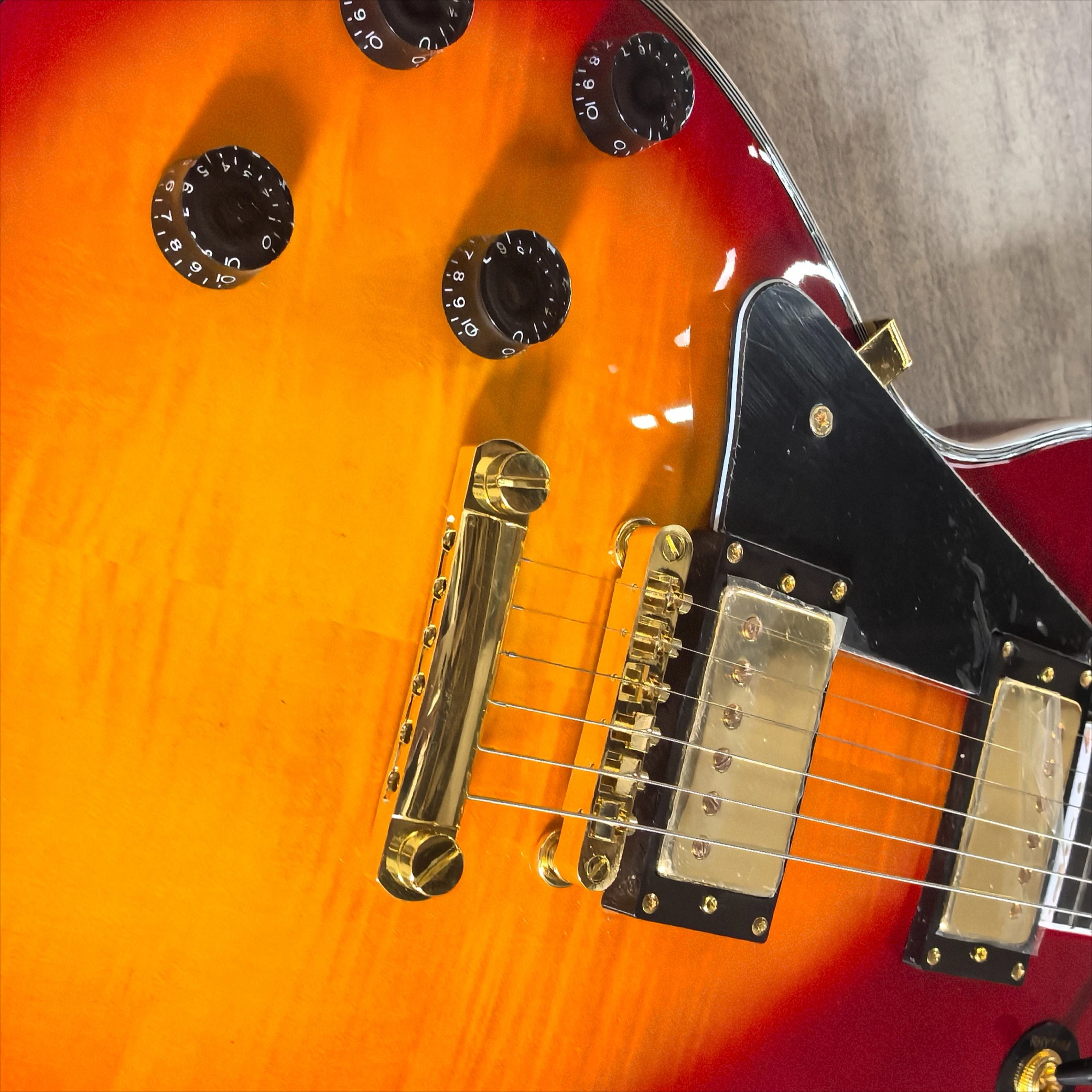 Hot LP007 Sunset Gradient Tiger Pattern Black Shield Electric Guitar HH Microphone Left Hand Complete Gold Metal Hardware
