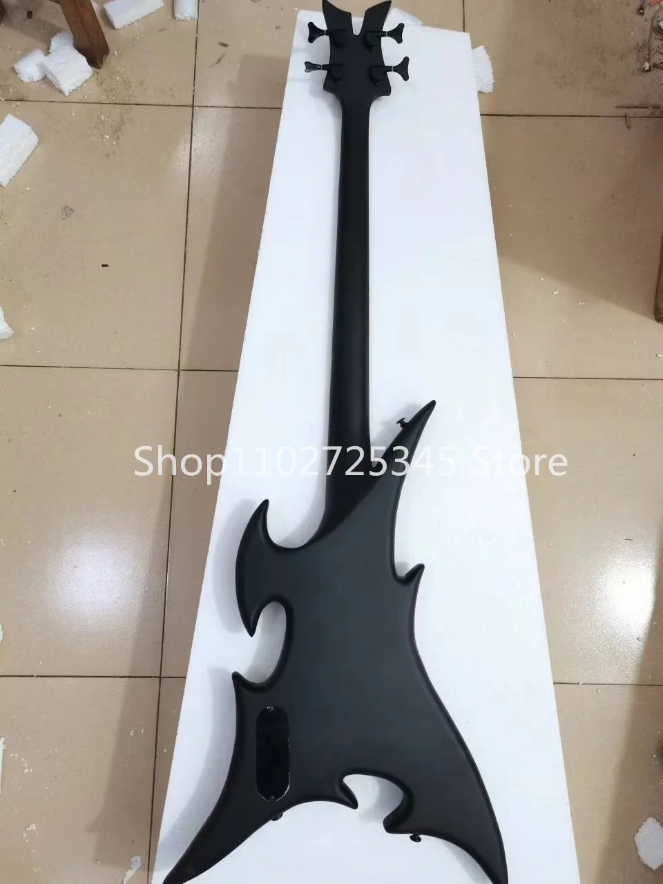 4 string bass, matte black paint, black accessories, rose wood fingerboard, customizable