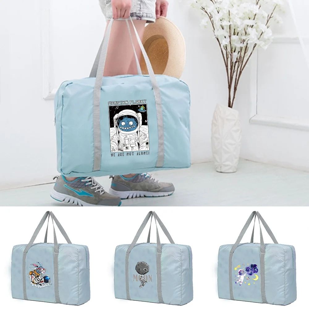 

Large Capacity Travel Bag Unisex Organizers Foldable Luggage Handbags Clothes Storage Duffle Carry on Bags Astronaut Series