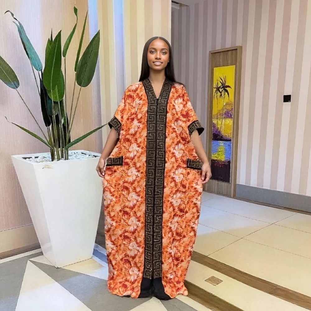 

2025 New Fashion Middle Eastern Bubu Popular Diamond Heavy Industry Flap Pocket Pantss on Both Sides Loose Muslim African Summer Printed Women's Dress